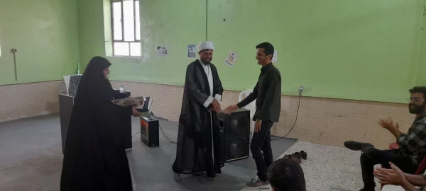 تجلیل از دانشجو معلم مرکز رودان، آقای اسلام بصری  برگزیده مسابقات کتابخوانی «فاطمه زهراس دختر محمد مصطفی ص» 3